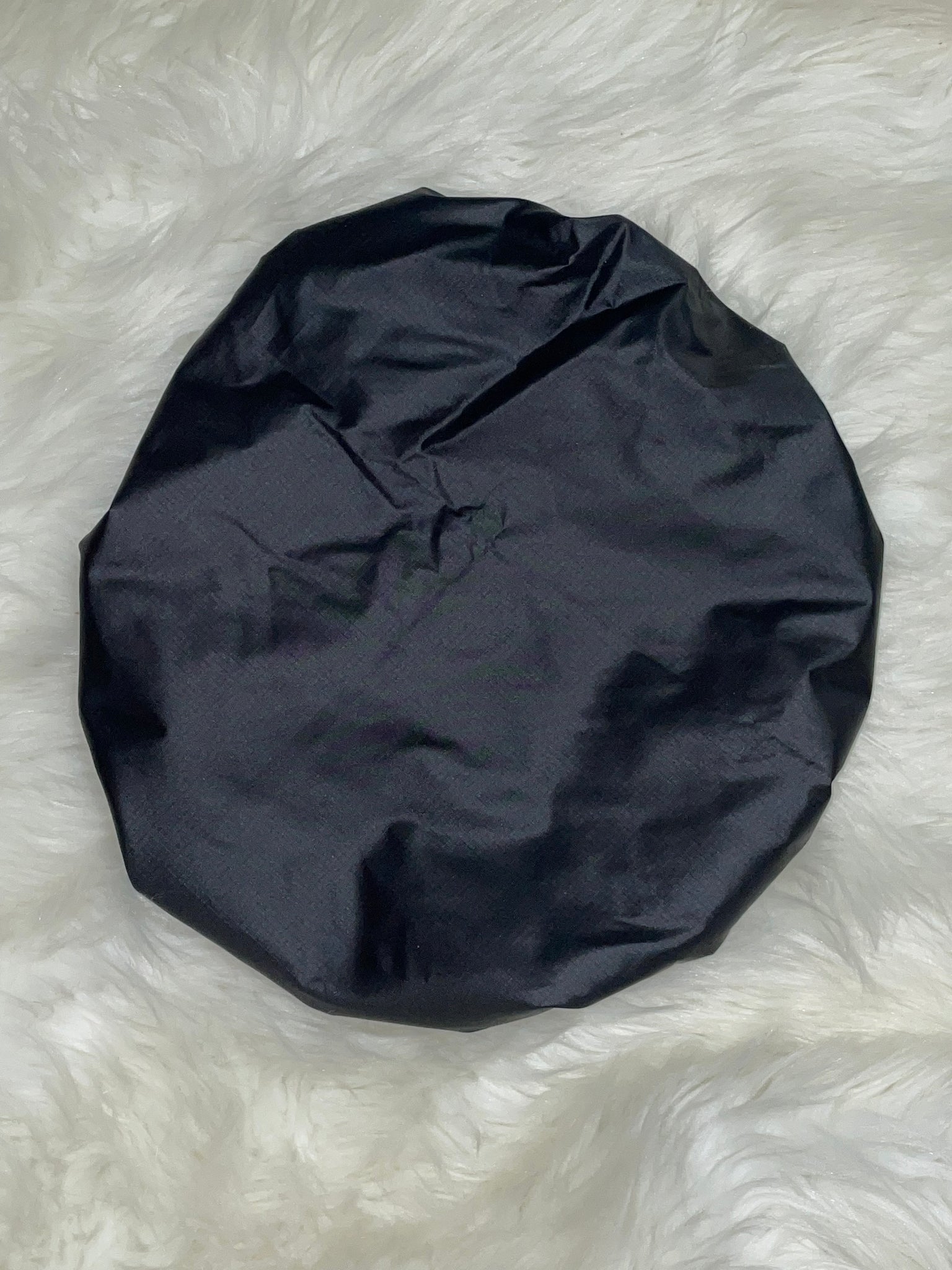 Shower cap with satin lining