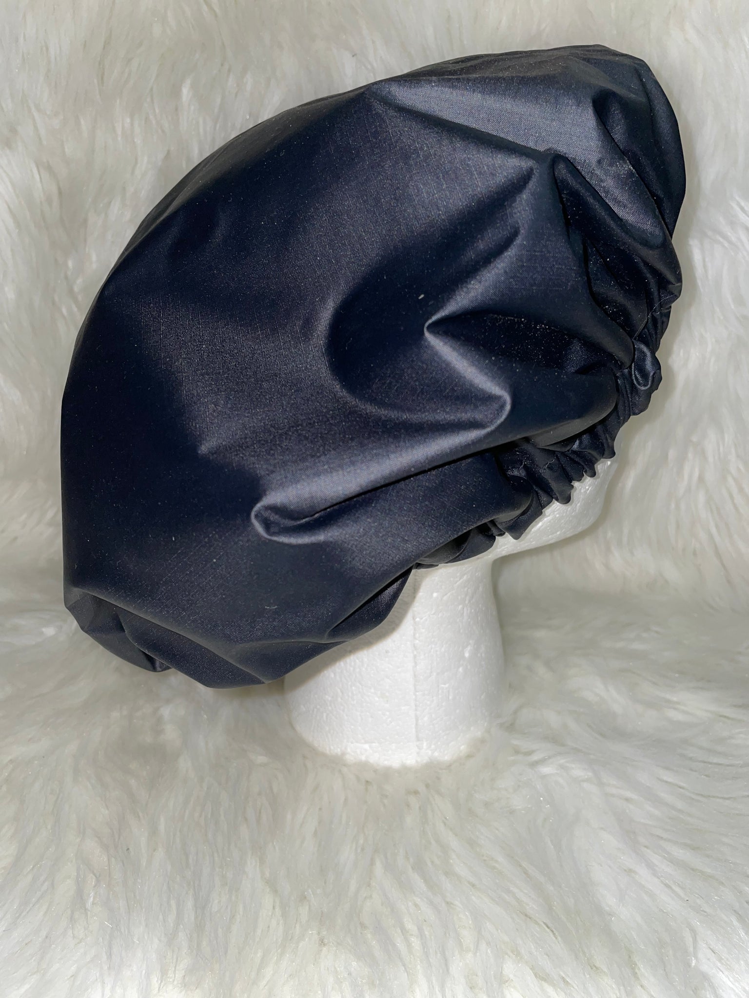 Shower cap with satin lining